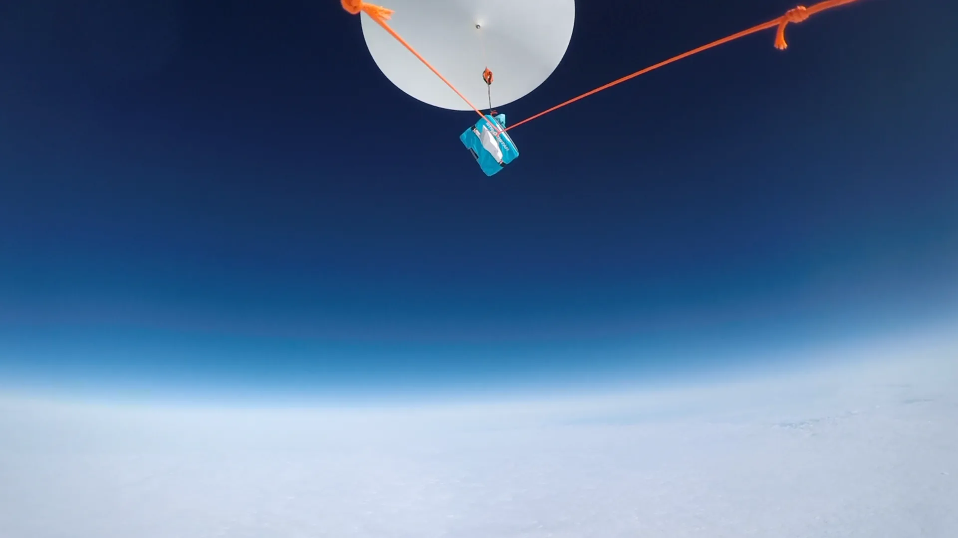 A StratoStar payload carrying a space component in near-space flight beneath the balloon