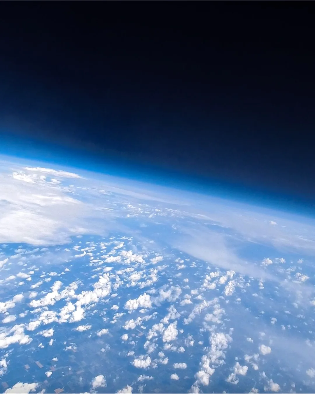 The curvature of the Earth and the black of space from a near-space flight
